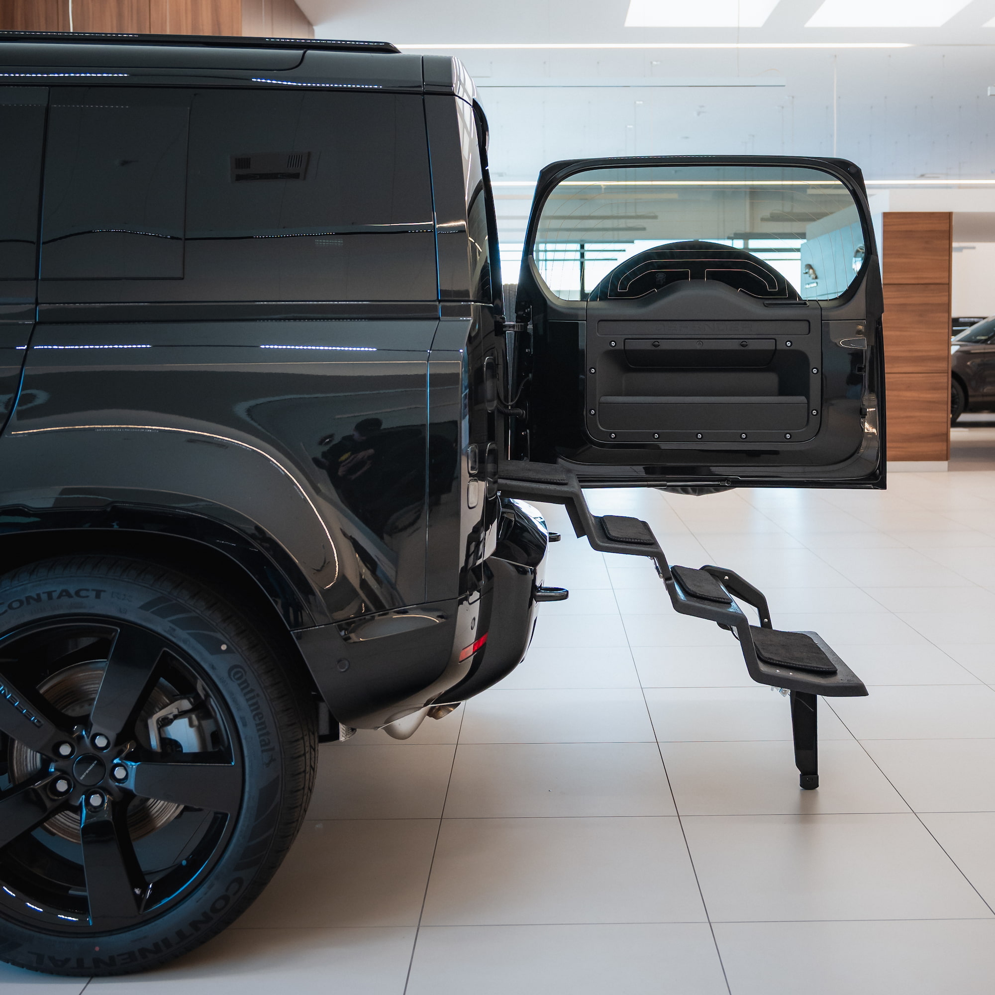 Dog & Drive dog steps fitted to a Land Rover Defender 110