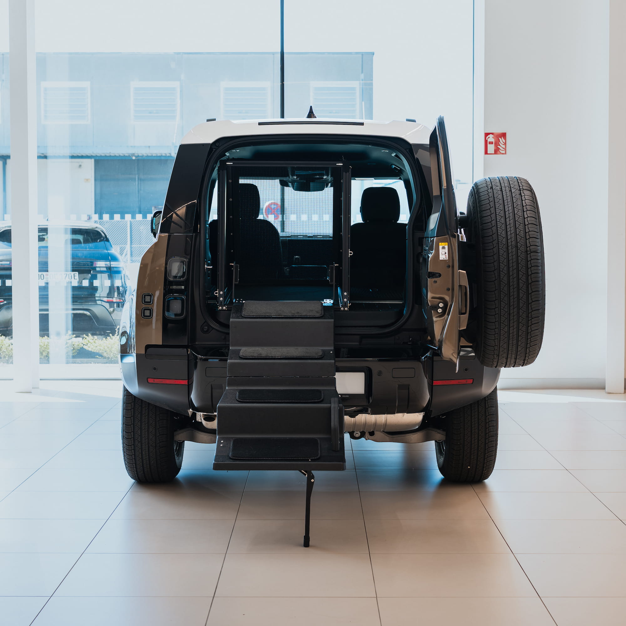 Dog & Drive dog steps fitted to a Land Rover Defender 90